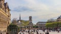 Paris / France - April 04 2019: Square in front of Hotel de Ville, the MunicipalityÃÂ of Paris, full of resting people at sunset.